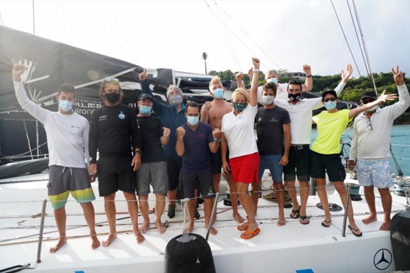 Celebrations on board Johannes Schwarz's Volvo 70 Green Dragon after winning the IMA Trophy and Monohull Line Honours in the RORC Transatlantic Race - Finishing in an elapsed time of 9 days, 18 hours, 53 mins and 40 secs photo copyright Ed Gifford / RORC taken at Royal Ocean Racing Club and featuring the Volvo 70 class