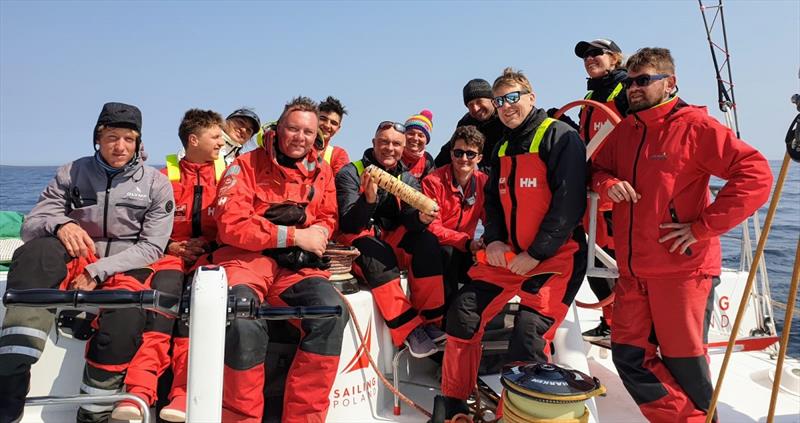 Bouwe Bekking and the crew of Sailing Poland cross the line off Stockholm with the Relay4Nature baton photo copyright Tomasz-Piotrowski_Sailing-Poland / The Ocean Race taken at  and featuring the Volvo One-Design class