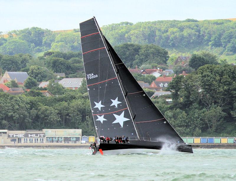 The 2023 Round the Island Race fleet pass through the Hurst narrows photo copyright Sam Jardine taken at Island Sailing Club, Cowes and featuring the Volvo 70 class