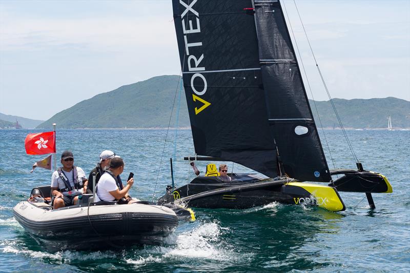 Vortex Pod Racer in Hong Kong: last minute instructions for Drew Taylor photo copyright Guy Nowell taken at  and featuring the Vortex class