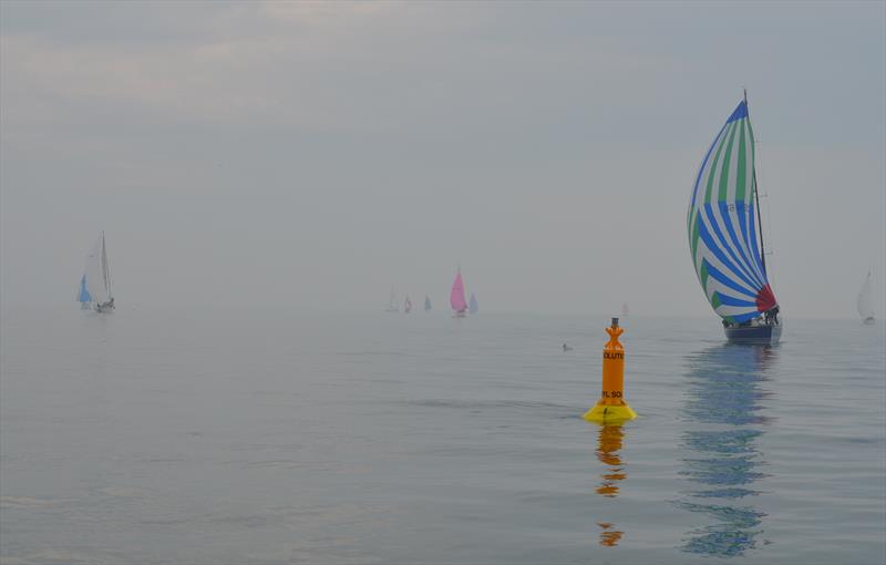 The fleet in very light winds during the Poole Yacht Racing Association Pursuit Race photo copyright Roger Bond taken at Poole Yacht Racing Association and featuring the VPRS class