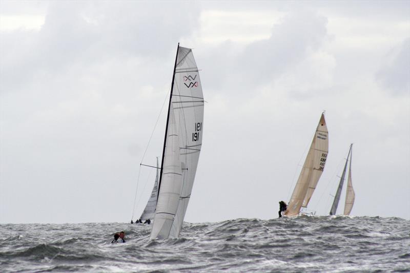 Zhik (VX One) leads Filska (Melges 24) during the Royal Northumberland Yacht Club Regatta photo copyright Alan Smith taken at Royal Northumberland Yacht Club and featuring the VX One class