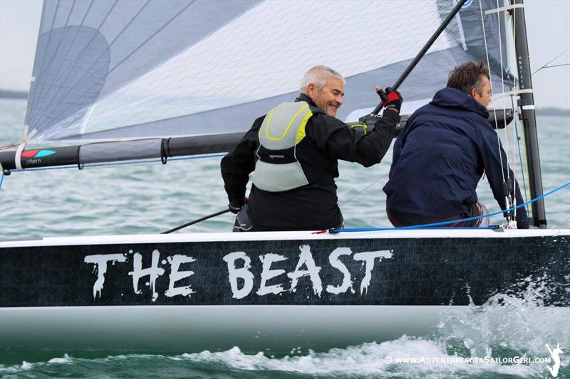 Michael James leading race 7 before the rain cloud on day 3 of the Australian VX One Midwinter Championship photo copyright Nic Douglass / www.AdventuresofaSailorGirl.com taken at Royal Queensland Yacht Squadron and featuring the VX One class