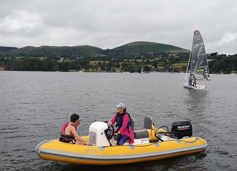 The first runner is ferried to his team boat in the Ullswater Yacht Club Three Peaks Challenge photo copyright Sue Giles taken at Ullswater Yacht Club and featuring the VX One class