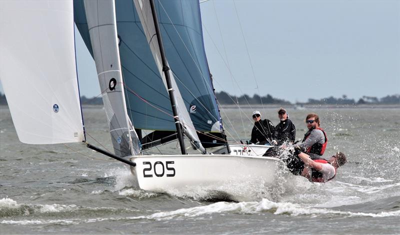 Helmsman Jerry Callahan concentrates on the course while his crew hikes hard aboard the VX One Magic Bus - 2021 Charleston Race Week - Day 2 - photo © Willy Keyworth