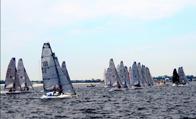 Trevor Parekh's #123 [315], ‘Bro Safari' and Hayden Bennett's # 269, ‘Double the Fun' from Newport RI, were both OCS, both over early on the start, pushing hard for positions right at the pin end of the line. They both had to dip the line to restart photo copyright Talbot Wilson taken at Pensacola Yacht Club and featuring the VX One class