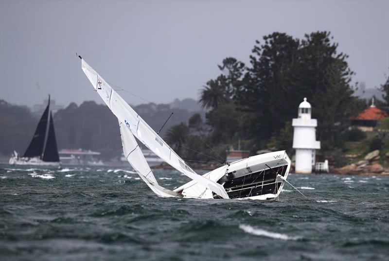 Rapture on her side and minus her crew - 2026 Nautilus Marine Insurance Sydney Harbour Regatta - photo © Brett Costello / MHYC