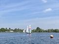 W1004 leading lap 2 in race 2 on the downwind leg, with W1795 and W1800 close behind during the Cotswold Wanderer Open &copy; Hannah Brooks
