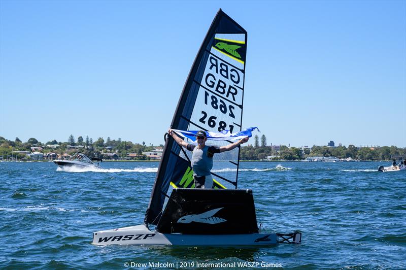 Rory Hunter with the Scottish flag after winning the 2019 International WASZP Games photo copyright Drew Malcolm / 2019 International WASZP Games taken at Royal Freshwater Bay Yacht Club and featuring the WASZP class