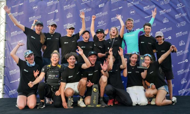 Young sailors in the SailGP Inspire programmes celebrate on the podium with Nina Curtis of Australia SailGP Team, on Race Day 2. Australia Sail Grand Prix presented by KPMG. 18 December 2021. - photo © Bob Martin for SailGP