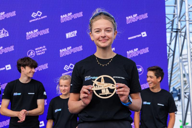 Young sailors take part in the Inspire Racing x WASZP program celebrate on stage on Race Day 2 of the ROCKWOOL Denmark Sail Grand Prix in Copenhagen, Denmark photo copyright Felix Diemer for SailGP taken at  and featuring the WASZP class