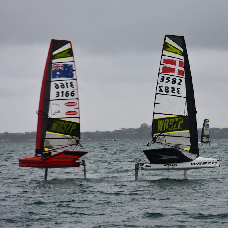 WASZP Australian Nationals Day 3: Aidan Simmons taking on Magnus Overbeck from Denmark down the run photo copyright Marc Ablett taken at Sorrento Sailing Couta Boat Club and featuring the WASZP class