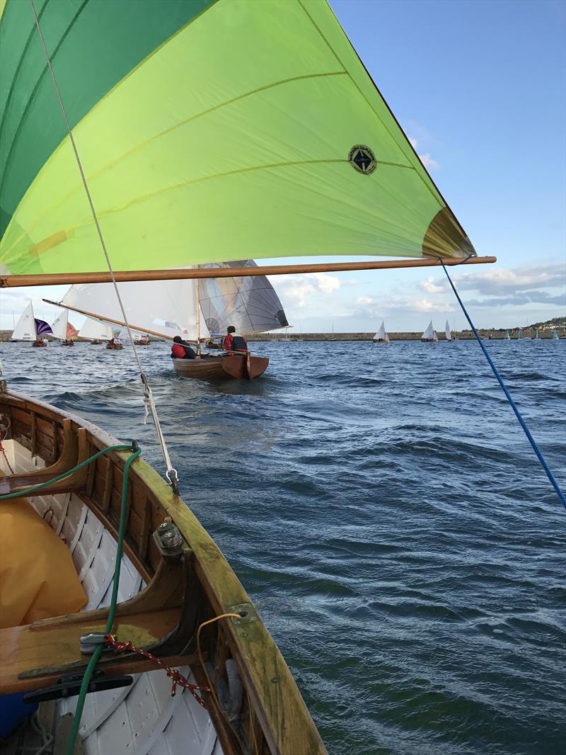 Water Wag Polly (No. 31) as viewed from Eros (No. 8) photo copyright Vincent Delany taken at Royal Irish Yacht Club and featuring the Water Wag class