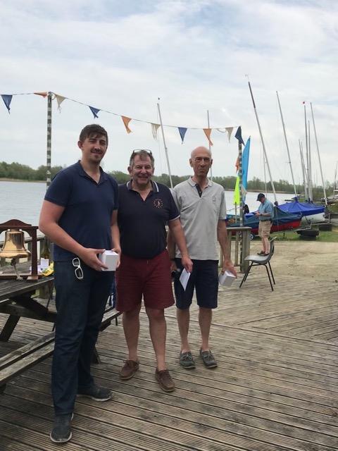 Winners Tom(l) and Andrew(r) Wilson receive their prizes from Les Burton photo copyright Belinda O'Donnell / Derek Lamber taken at West Oxfordshire Sailing Club and featuring the Wayfarer class