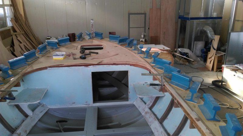 Here the plywood decks are being fastened down and will be covered with WEST SYSTEM epoxy photo copyright Wessex Resins & Adhesives taken at  and featuring the  class