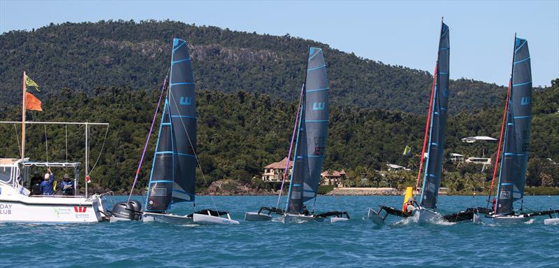 Wetas line up for a start - Airlie Beach Race Week 2022 photo copyright Shirley Wodson / ABRW taken at Whitsunday Sailing Club and featuring the Weta class