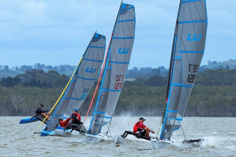 Multiple national champion of many classes, George Owen, in the lead photo copyright Russell Witt taken at  and featuring the Weta class