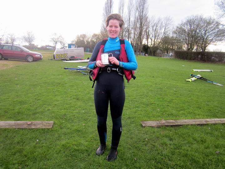 Victorious Cambridge Second String Survivor Helen White with the Jubilee Tankard photo copyright Anthony Butler taken at Grafham Water Sailing Club and featuring the Windsurfing class