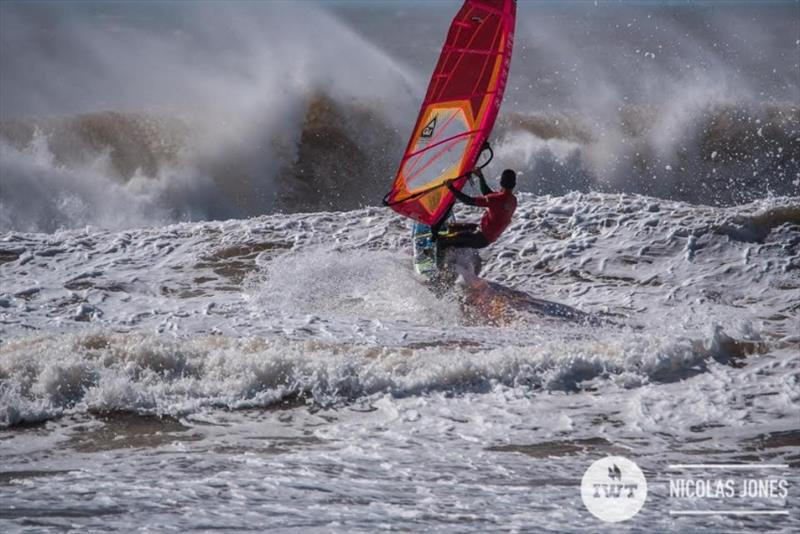 Amateur Champion Faycel Hmisi heads into the gnarly conditions photo copyright Nicolas Jones / IWT taken at  and featuring the Windsurfing class