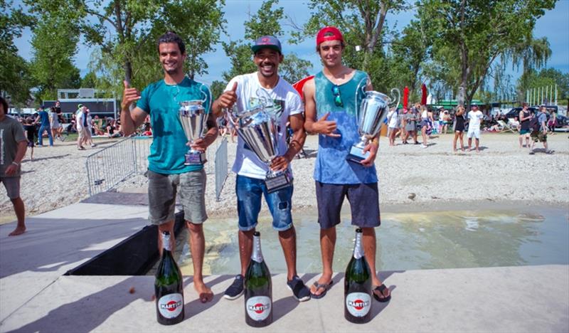 Giovanni Passani, Tonky Frans and Sam Esteve - Winners of the freestyle competition after a little champagne shower photo copyright Martin Reiter taken at  and featuring the Windsurfing class