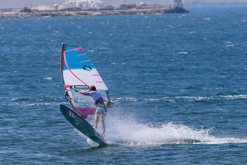 Throw your body forward and get yourself over the sail by pushing it down with the mast hand and sheeting in with the sail hand photo copyright Tricktionary taken at  and featuring the Windsurfing class