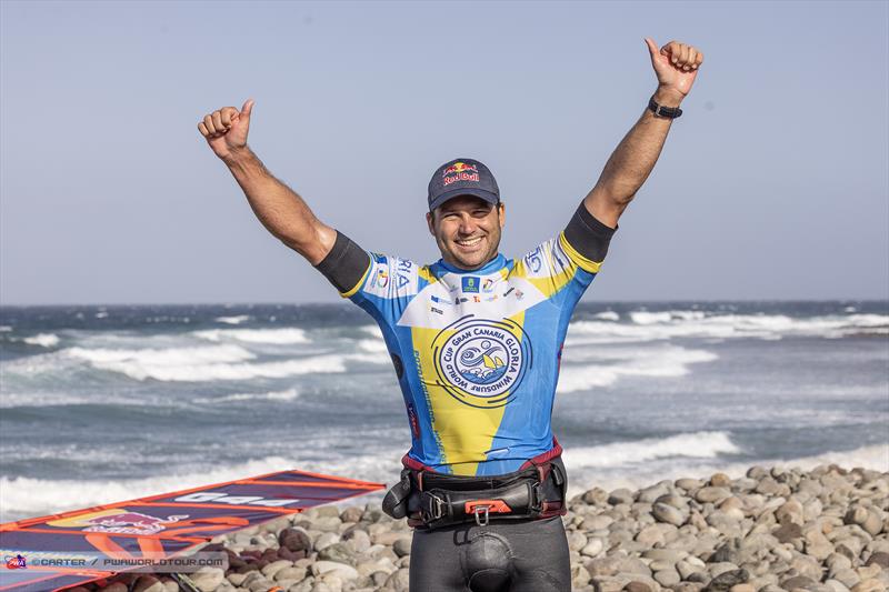 Philip Ko¨ster all smiles after claiming victory in Single Elimination on day 1 of the Gran Canaria Gloria Windsurf World Cup photo copyright John Carter taken at  and featuring the Windsurfing class