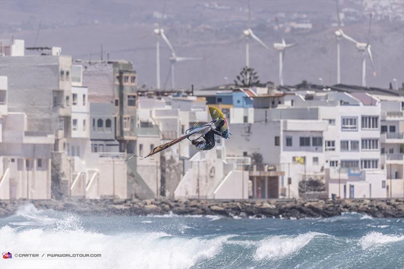 Alexia Kiefer Quintana mid backloop before injuring her shoulder on day 3 of the Gran Canaria Gloria Windsurf World Cup photo copyright John Carter taken at  and featuring the Windsurfing class
