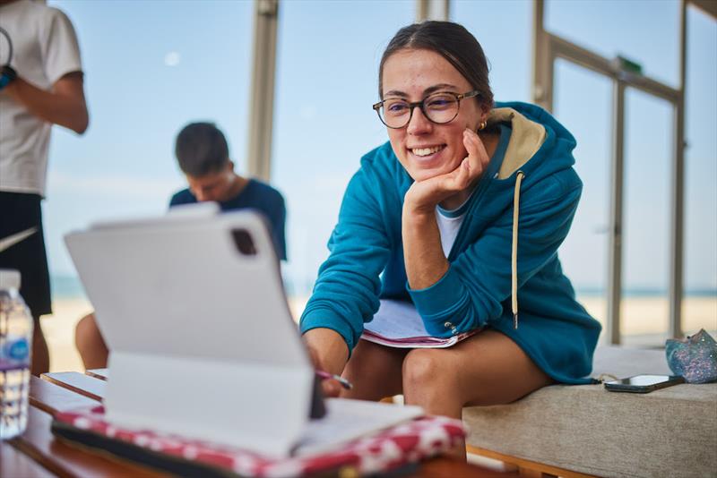 Kylie Belloeuvre, trying to do some study for her engineering degree photo copyright IWSA / Robert Hajduk taken at  and featuring the Wing Foil class