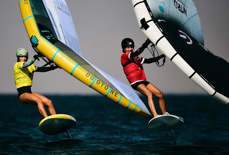 Orane Ceris (right) staying ahead of her friend Paula Novotna - Ad Ports Group Wingfoil Racing World Cup Abu Dhabi photo copyright IWSA / Robert Hajduk taken at  and featuring the Wing Foil class