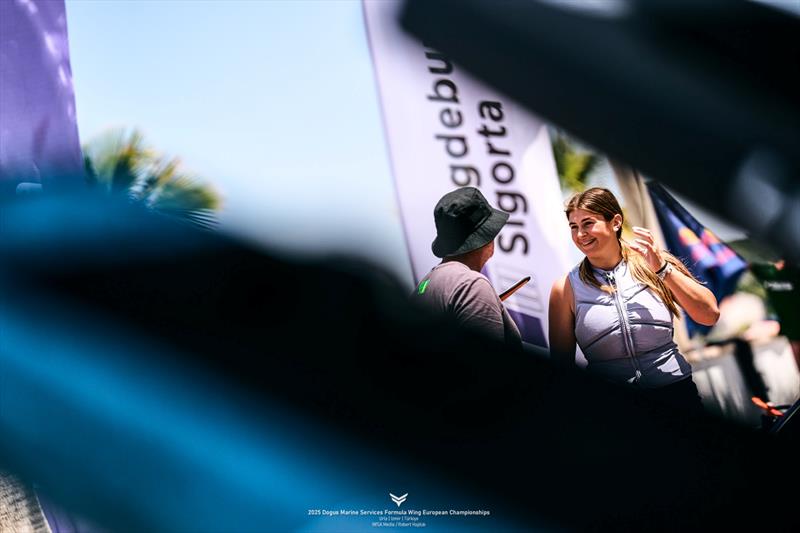 Maddalena Spanu [ITA)]passes time while waiting for the breeze to top eight knots - 2025 Dogus Marine Services Formula Wing European Championships - Day 2 - photo © IWSA media / Robert Hajduk