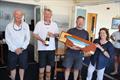 Athena X51 - David McGregor and crew receiving the Central Solent Championship Trophy from HRSC Commodore Serena Alexander © Phil Horton