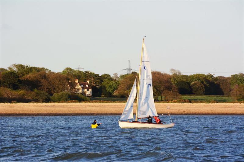Satu aground during the HRSC Wednesday Evening Bottle Pursuit photo copyright Trevor Pountain taken at Hamble River Sailing Club and featuring the XOD class