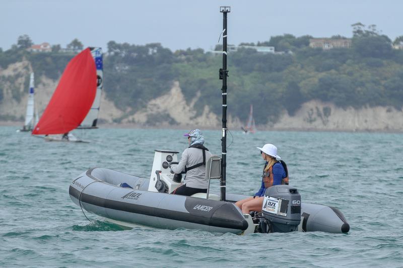 The lightweight kit for WindBot packs down into a a carry case and consists of the acoustic anemometer, with `The Brain`  or black box attached to the spar, which is secured to the coach boat. - photo © Richard Gladwell