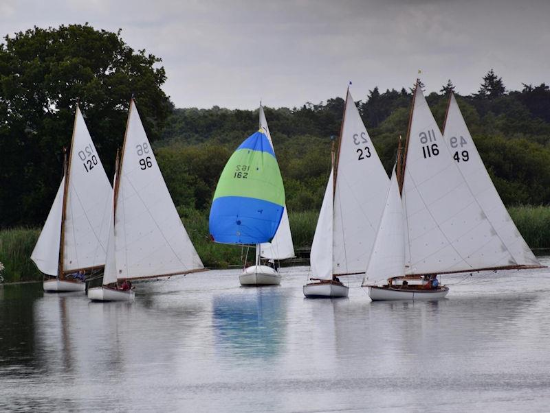 Yare & Bures and a Yeoman sailing downwind during Horning Sailing Club Regatta Week 2022 photo copyright Holly Hancock taken at Horning Sailing Club and featuring the Yare & Bure One Design class