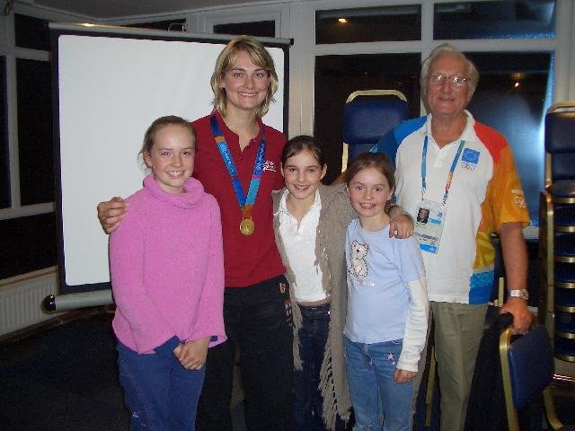 Sarah Webb with Brian Southcott and young club members of Tamesis Club photo copyright Jim Green taken at Tamesis Club and featuring the Yngling class