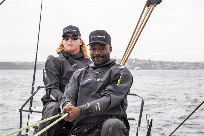 Charlie Wyatt (left) and Mustafa Ingham (right) aboard LawConnect - photo © Zhik